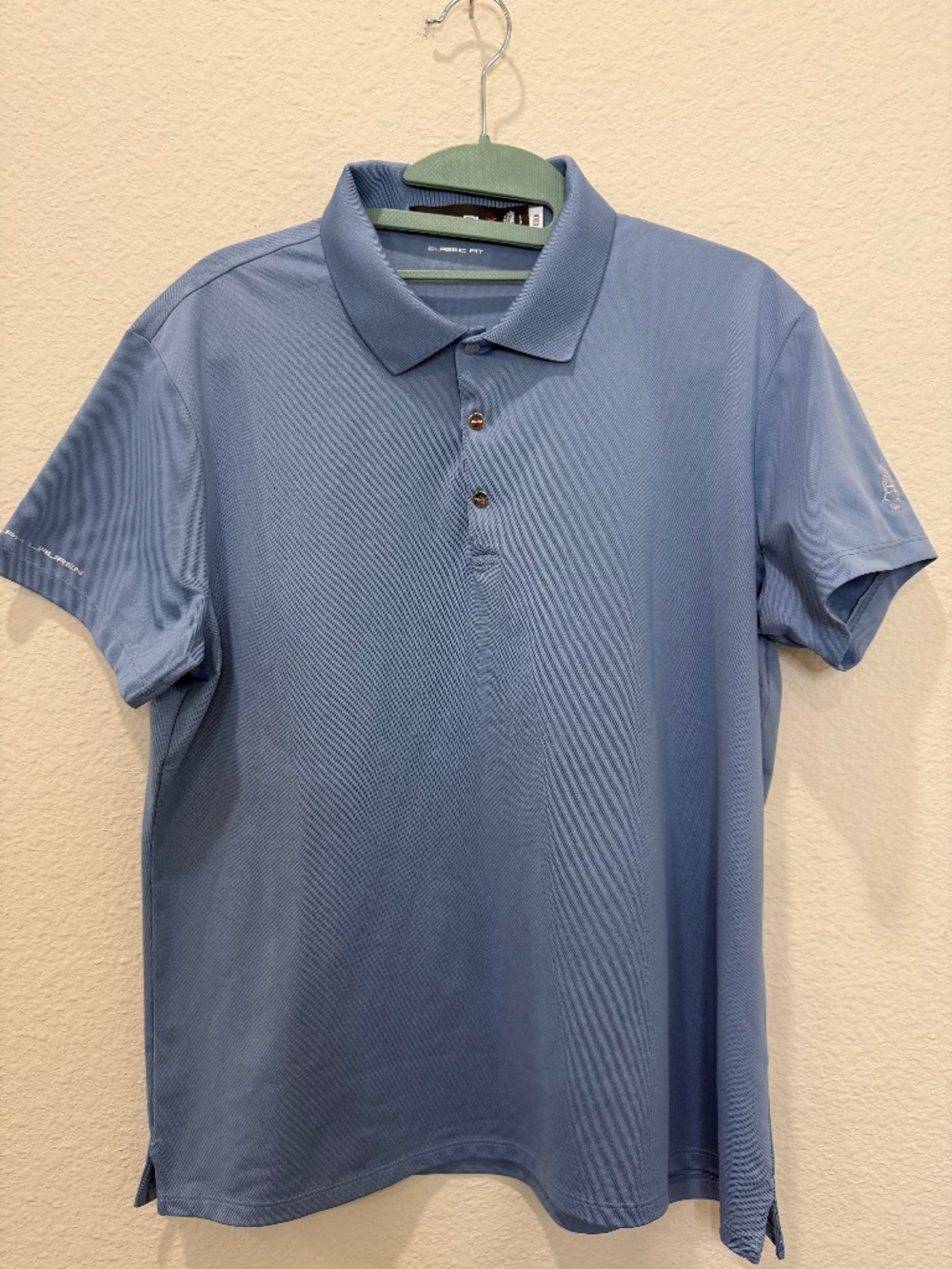 Ladies blue RLX Ralph Lauren’s polo shirt